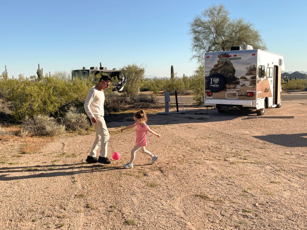 kids activities for an RV trip: Playing outside at the playground