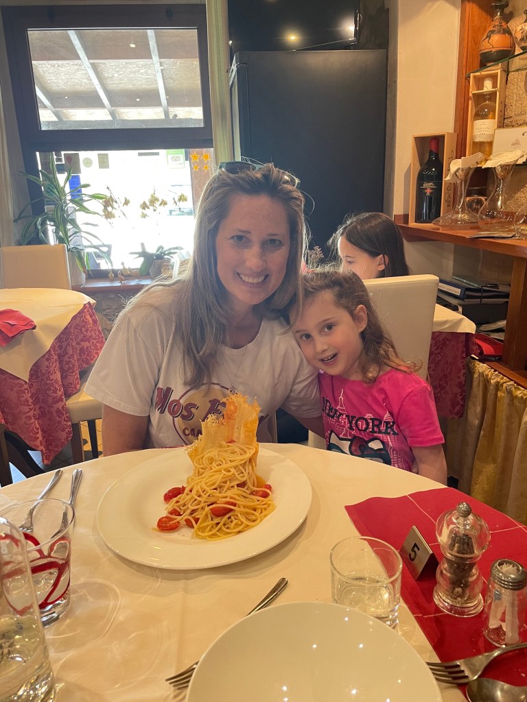 Eating pasta at an Italian restaurant in Gavorrano, Italy